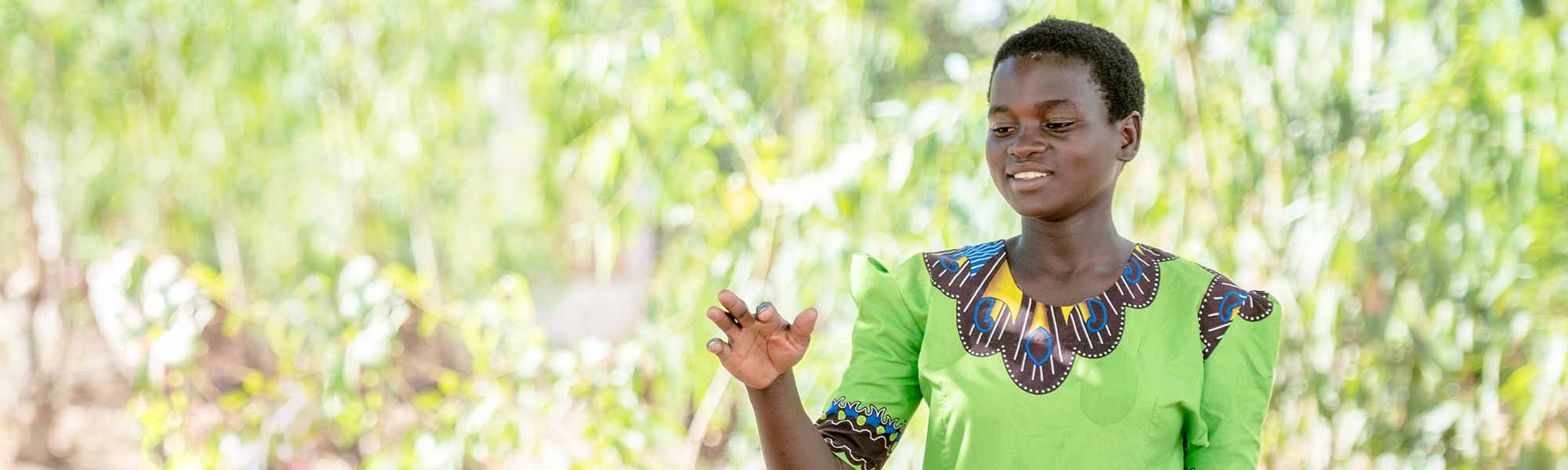 Kvinne underviser i Malawi. Vi jobber for å skape økonomisk selvstendighet for unge kvinner