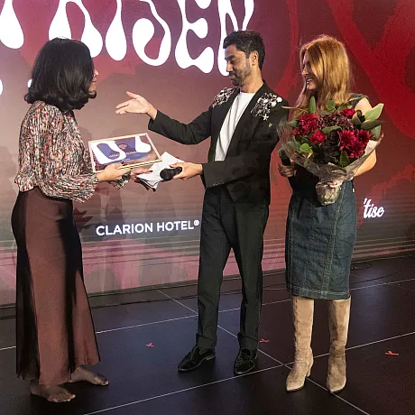 Wolasmal og to fra juryen