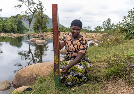 Stav som måler hvor mye det har regnet og brukes ved flomberedskap i Malawi.