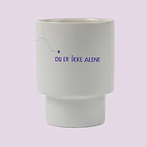 Gave med mening: Kopp "Du er ikke alene". Foto.